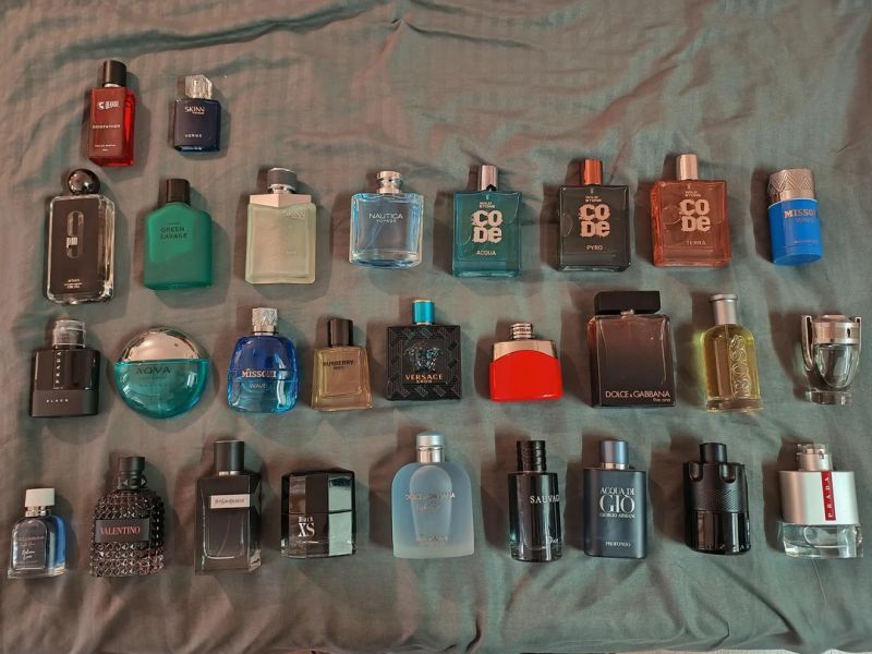 A fragrance wardrobe laid out in rows, showing how scent collecting and rotation have become everyday consumer behavior.